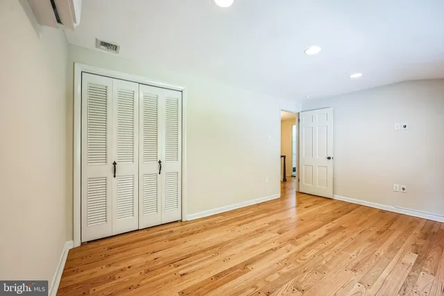 a view of a dining room with furniture and window