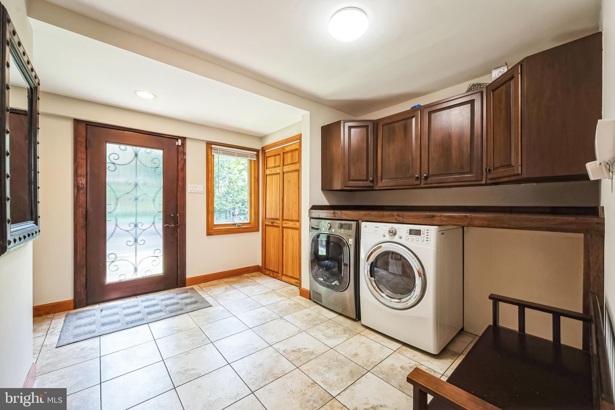 3574 Glenway Road Huntingdon Valley, PA 19006 - Photo 26 of 60 a view of a storage & utility room with washer and dryer