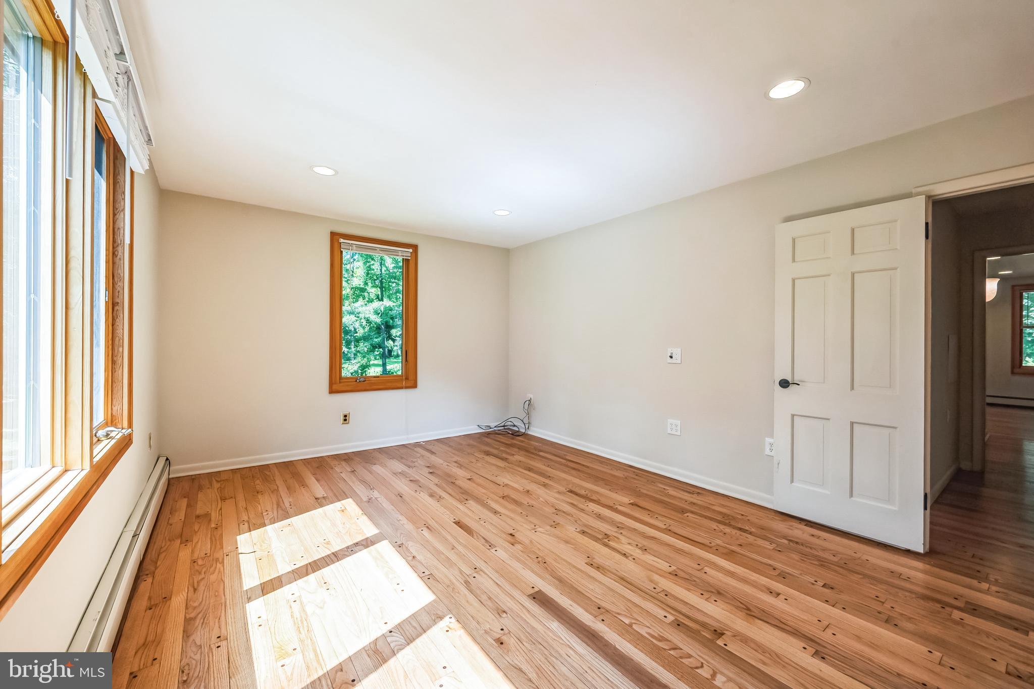 3574 Glenway Road Huntingdon Valley, PA 19006 - Photo 36 of 60 wooden floor in an empty room with a window