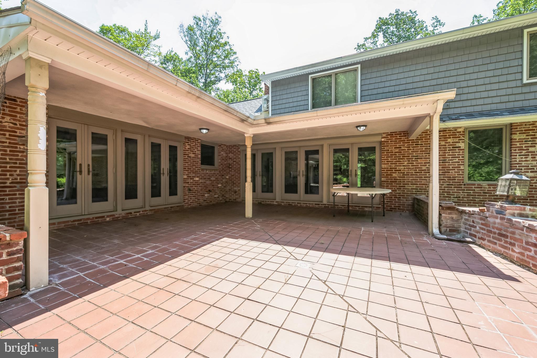 3574 Glenway Road Huntingdon Valley, PA 19006 - Photo 55 of 60 a view of house with backyard porch and glass door