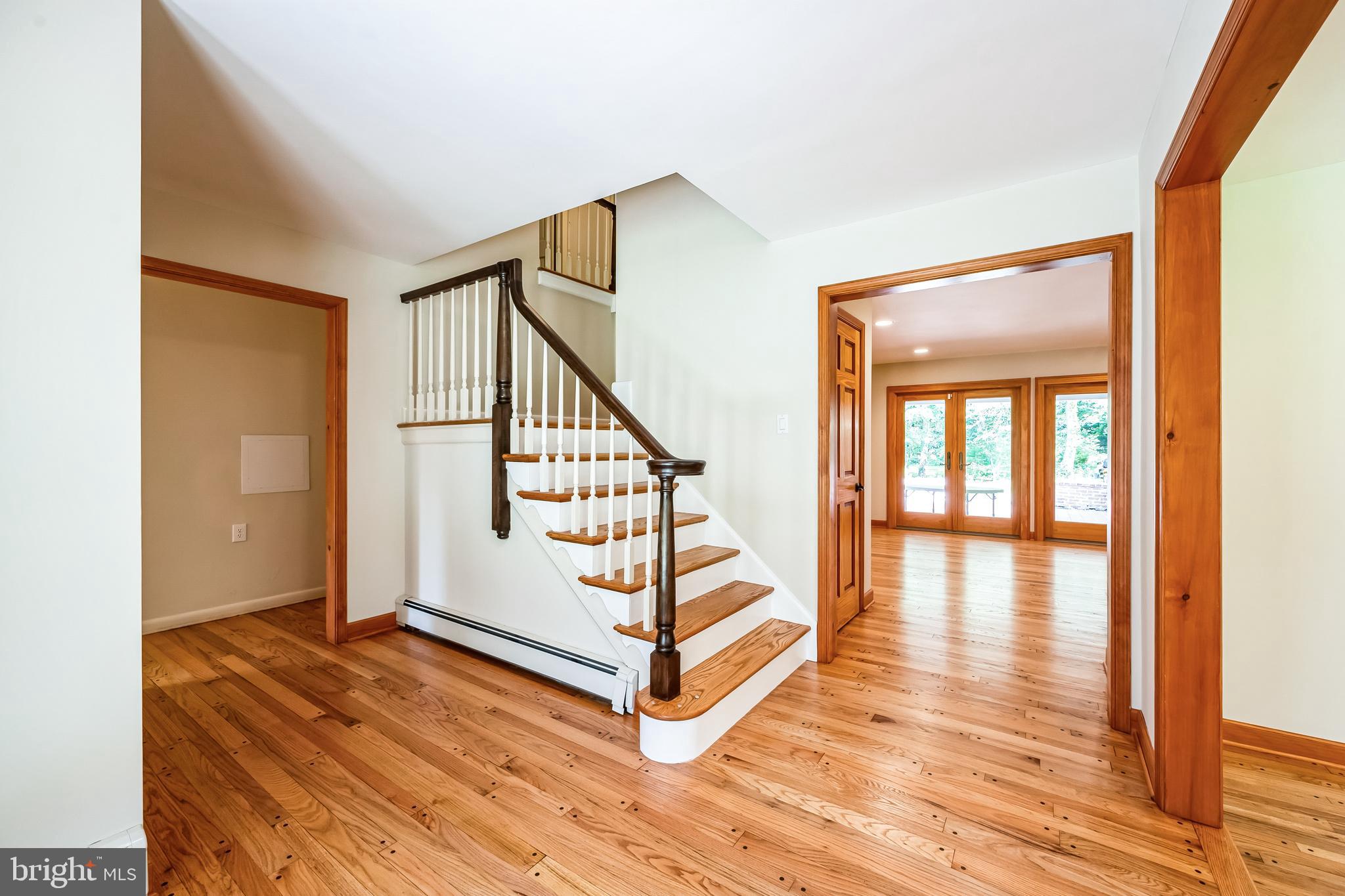 3574 Glenway Road Huntingdon Valley, PA 19006 - Photo 7 of 60 a view of entryway and hall with wooden floor