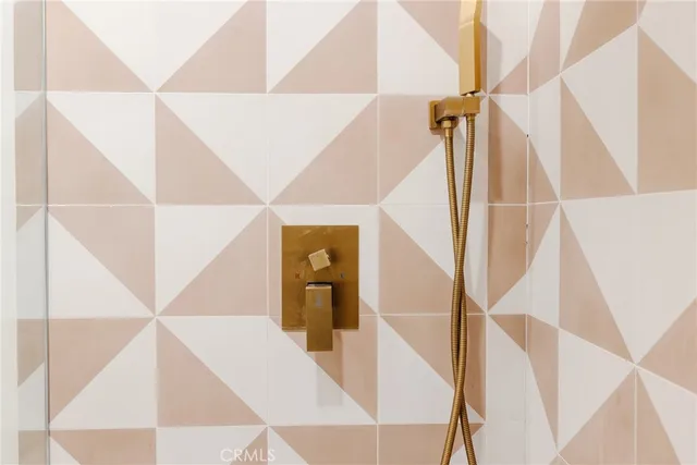 a view of a patio with table and chairs with wooden floor and fence
