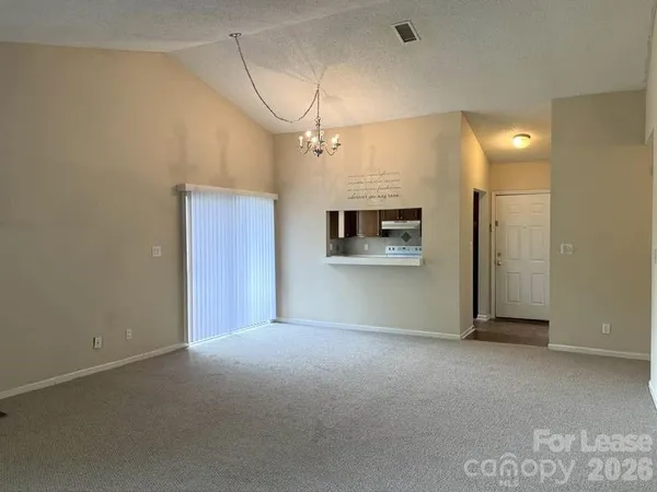 a view of a room with a garage