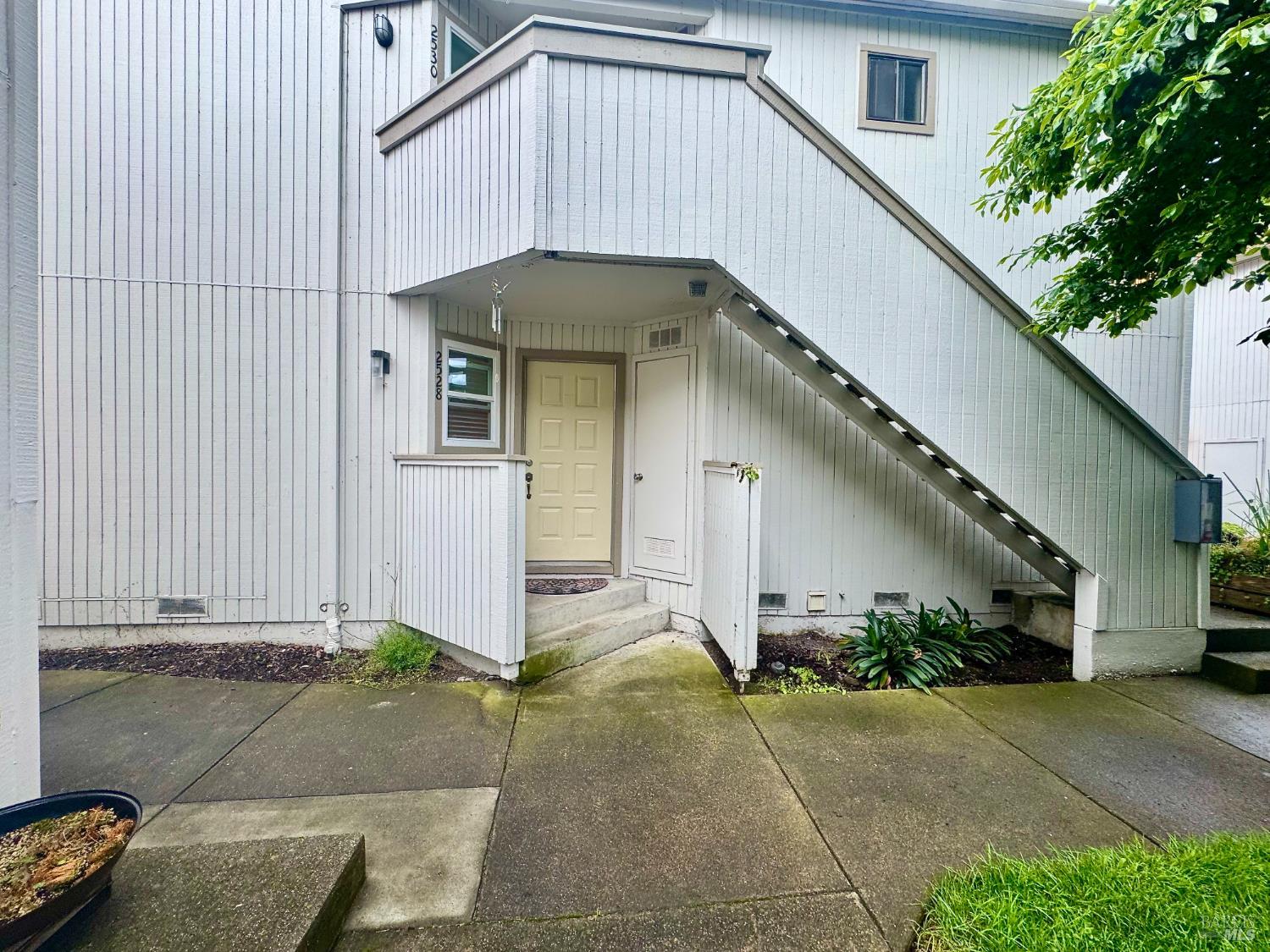 a house view with a outdoor space
