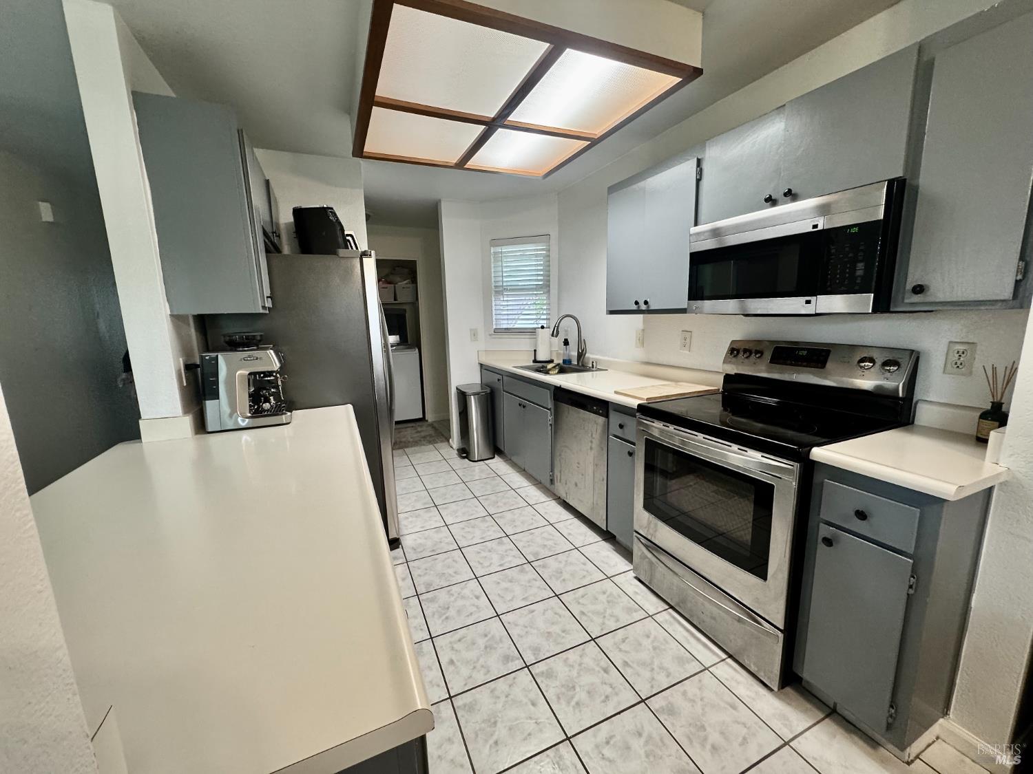 2528 Westberry Drive Santa Rosa, CA 95403 - Photo 12 of 37 a kitchen that has a sink and a stove in it