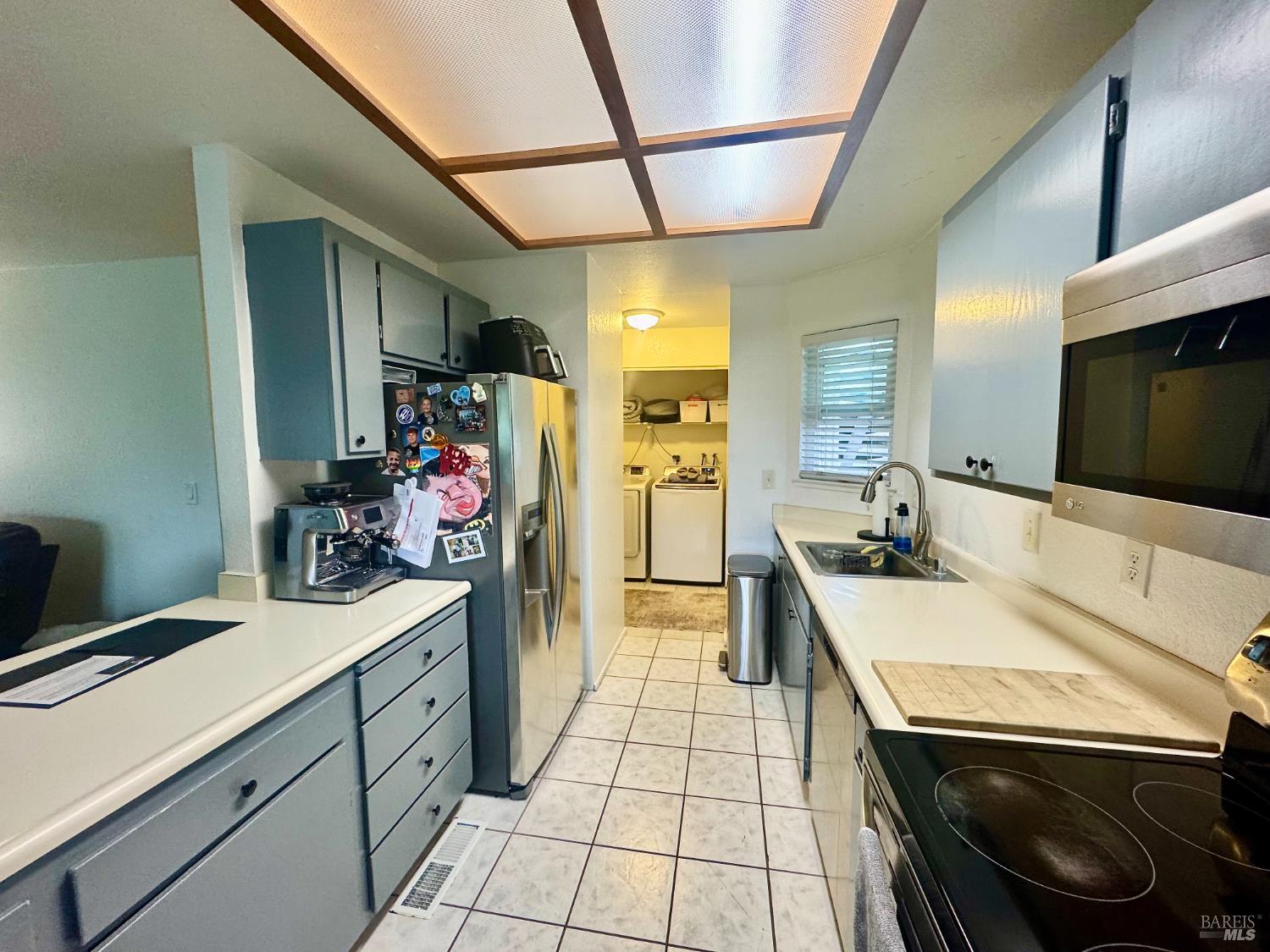 2528 Westberry Drive Santa Rosa, CA 95403 - Photo 13 of 37 a kitchen with a sink appliances and cabinets