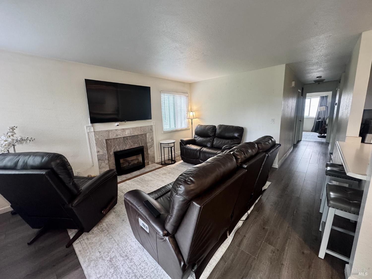 2528 Westberry Drive Santa Rosa, CA 95403 - Photo 17 of 37 a living room with furniture fireplace and flat screen tv