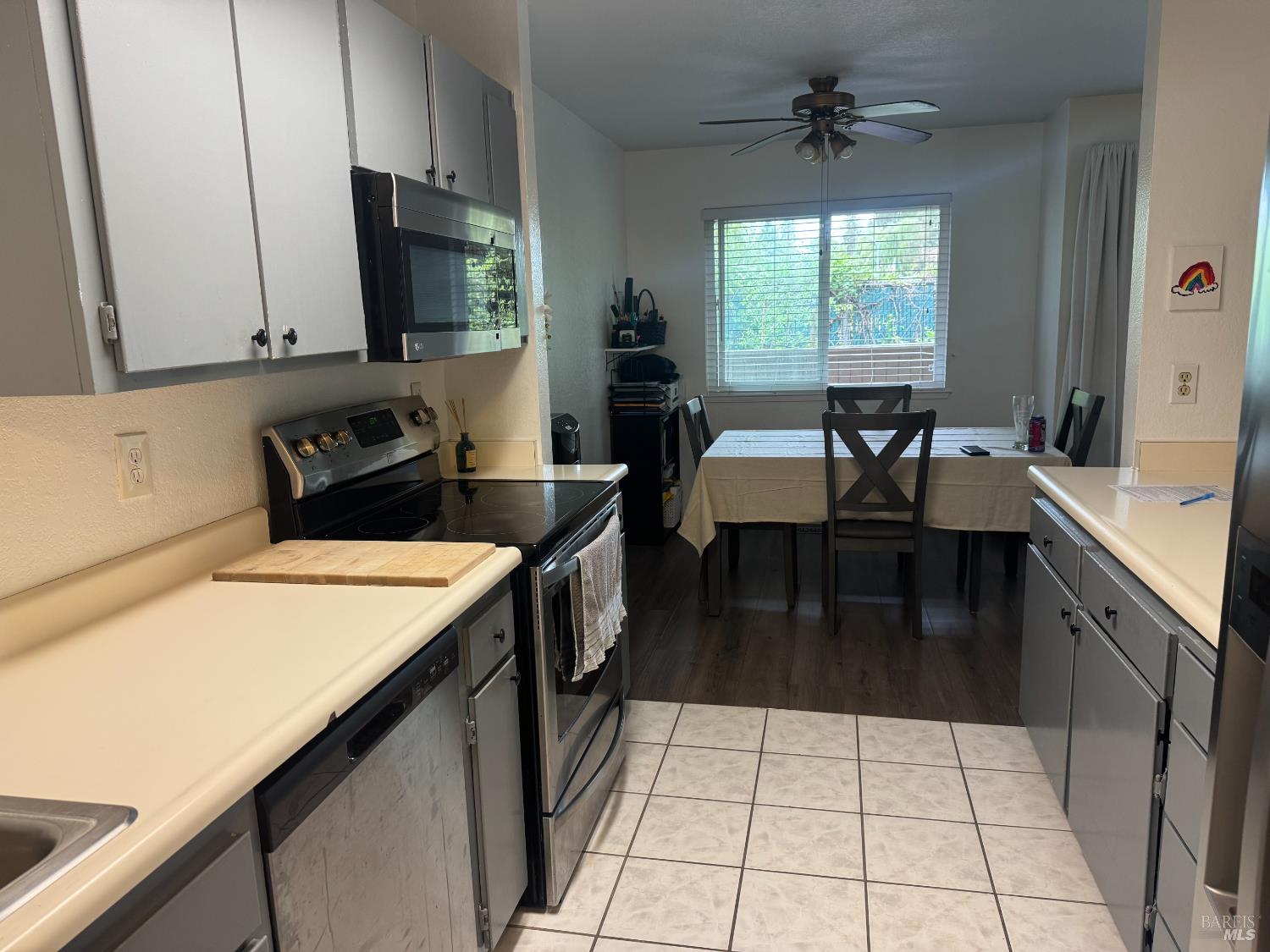 2528 Westberry Drive Santa Rosa, CA 95403 - Photo 19 of 37 a kitchen with a sink a counter top space appliances and cabinets