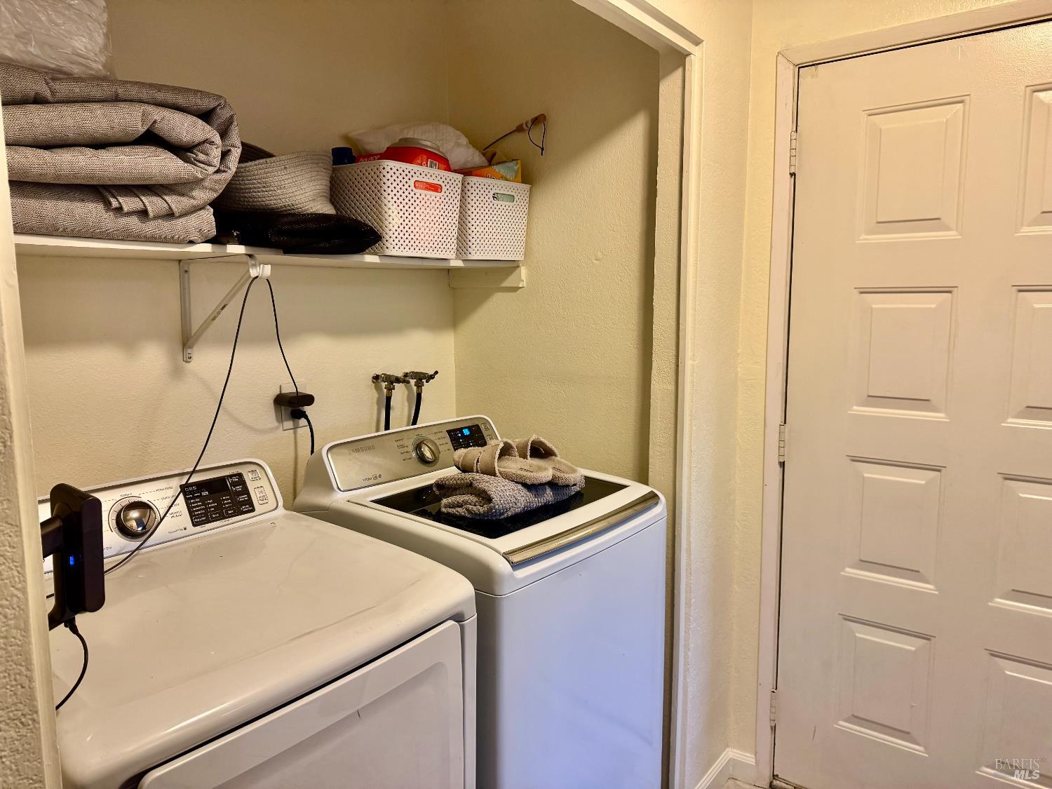 2528 Westberry Drive Santa Rosa, CA 95403 - Photo 22 of 37 a utility room with dryer and washer