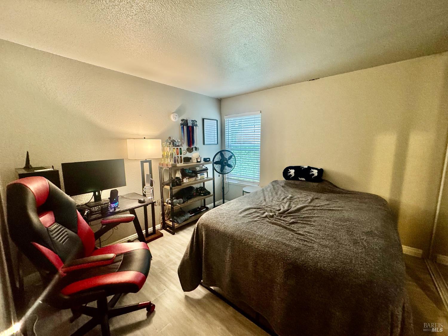 2528 Westberry Drive Santa Rosa, CA 95403 - Photo 28 of 37 a bed room with a bed and a chair
