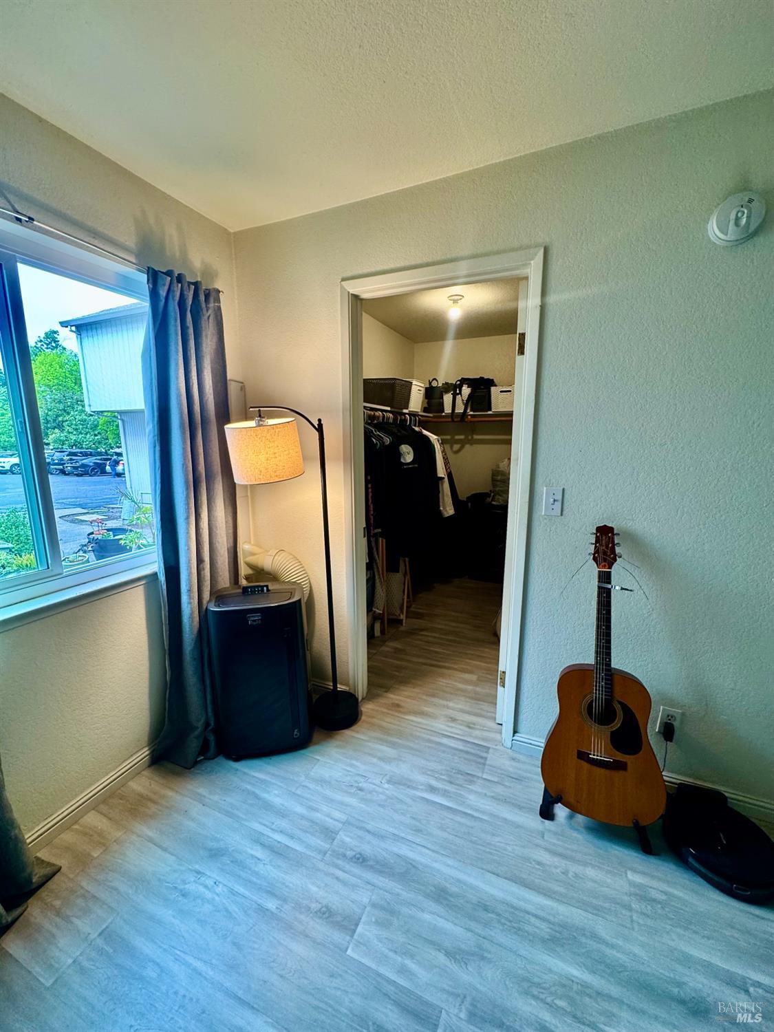 2528 Westberry Drive Santa Rosa, CA 95403 - Photo 29 of 37 a room with furniture and a window