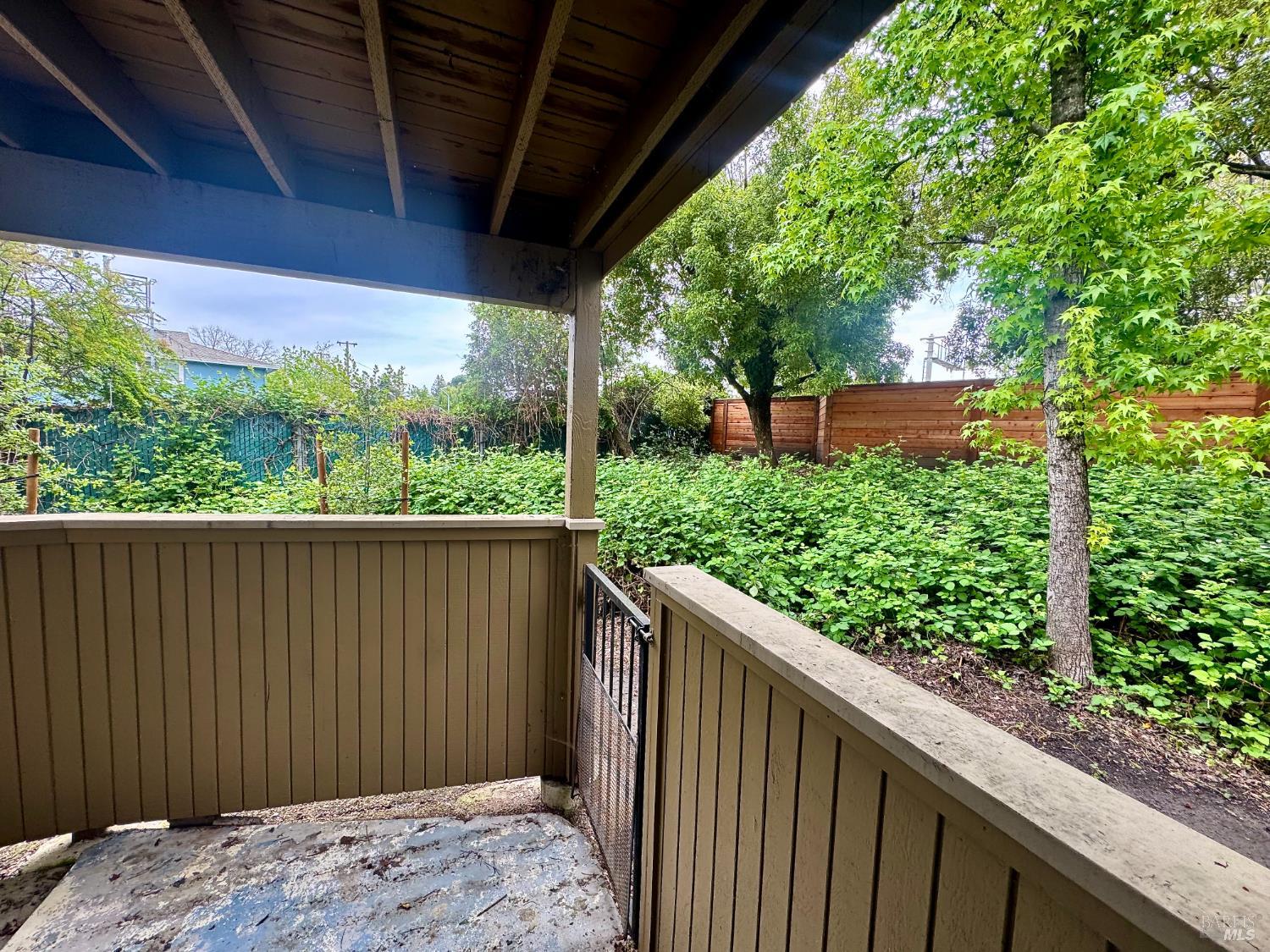 2528 Westberry Drive Santa Rosa, CA 95403 - Photo 37 of 37 a wooden fence with trees in the back