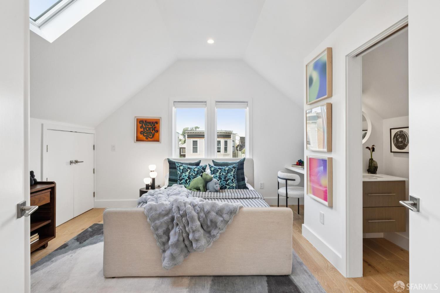 439 Clipper Street San Francisco, CA 94114 - Photo 45 of 71 a living room with furniture and a wooden floor