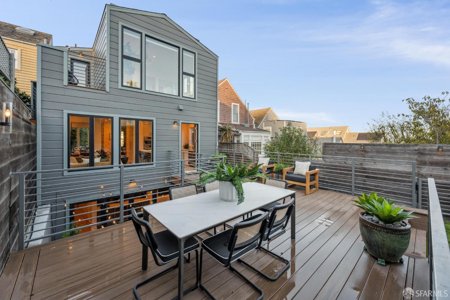 439 Clipper Street San Francisco, CA 94114 - Photo 62 of 71 a view of a patio with couches table and chairs and potted plants