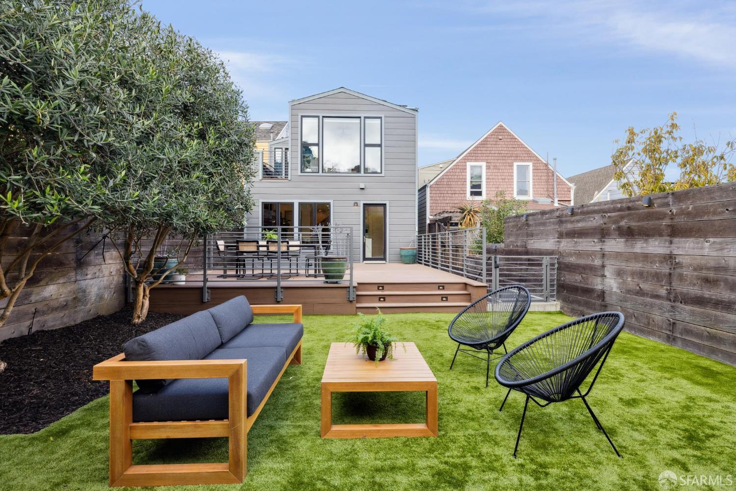 439 Clipper Street San Francisco, CA 94114 - Photo 68 of 71 a view of a swimming pool with couches chairs and a fire pit