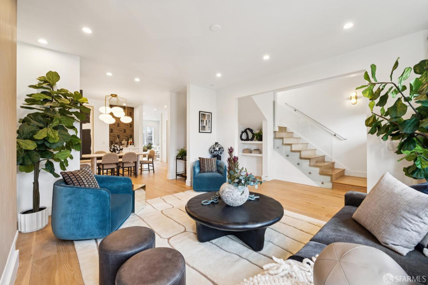 439 Clipper Street San Francisco, CA 94114 - Photo 7 of 71 a living room with furniture potted plant and a wooden floor
