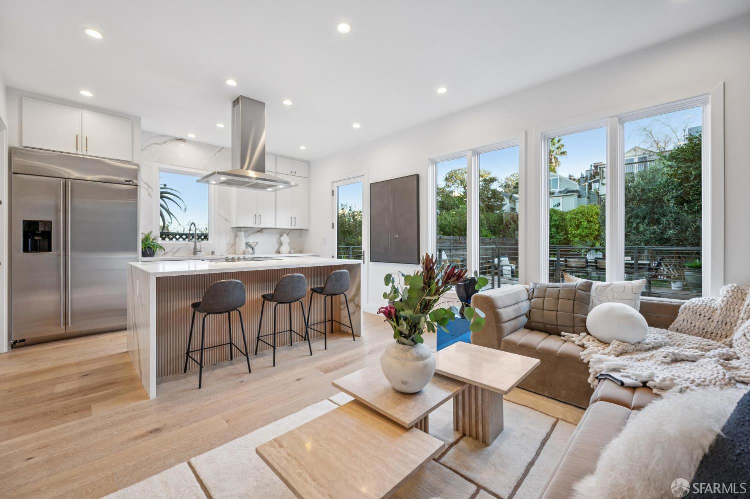 439 Clipper Street San Francisco, CA 94114 - Photo 10 of 71 a living room with lots of furniture and a large window
