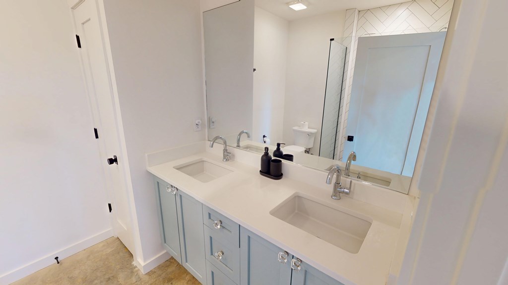 458 Brannon Ridge Young Harris, GA 30582 - Photo 24 of 33 a bathroom with a sink and a mirror