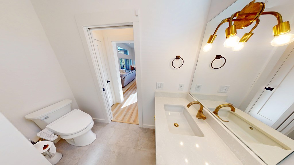 458 Brannon Ridge Young Harris, GA 30582 - Photo 25 of 33 a bathroom with a sink mirror vanity and toilet