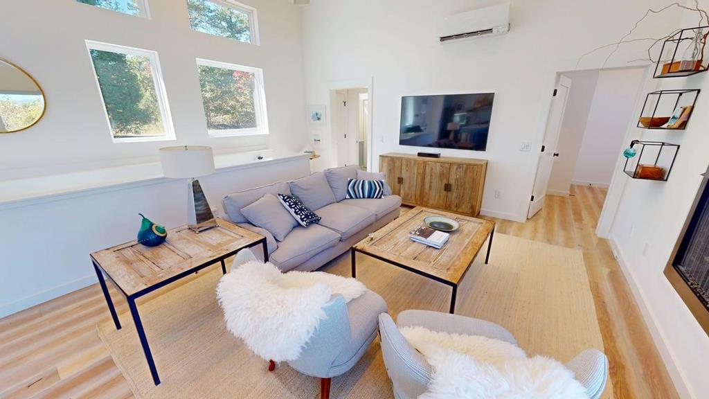 458 Brannon Ridge Young Harris, GA 30582 - Photo 26 of 33 a living room with furniture and a flat screen tv