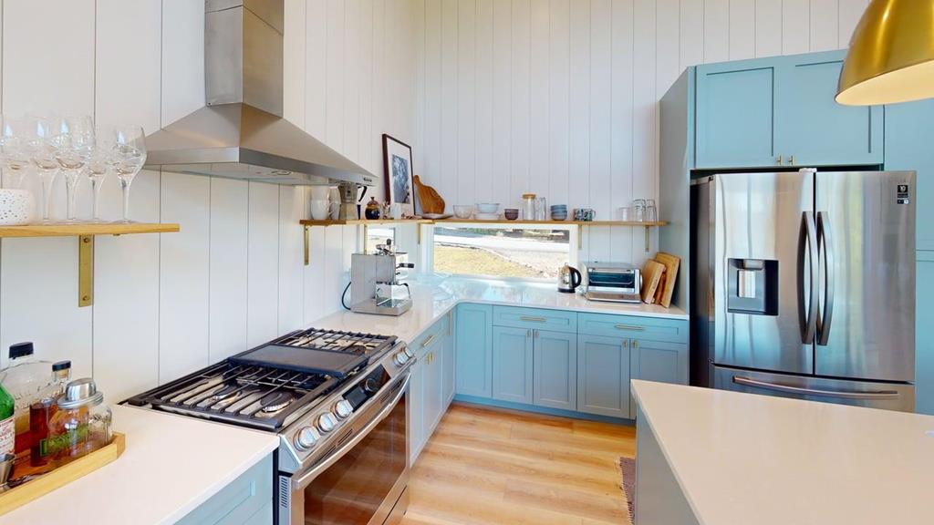 458 Brannon Ridge Young Harris, GA 30582 - Photo 3 of 33 a kitchen with stainless steel appliances granite countertop a sink stove and refrigerator