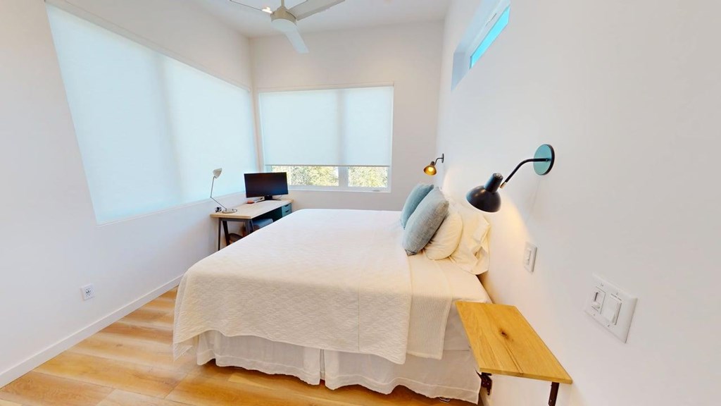 458 Brannon Ridge Young Harris, GA 30582 - Photo 9 of 33 a bedroom with a bed and wooden floor