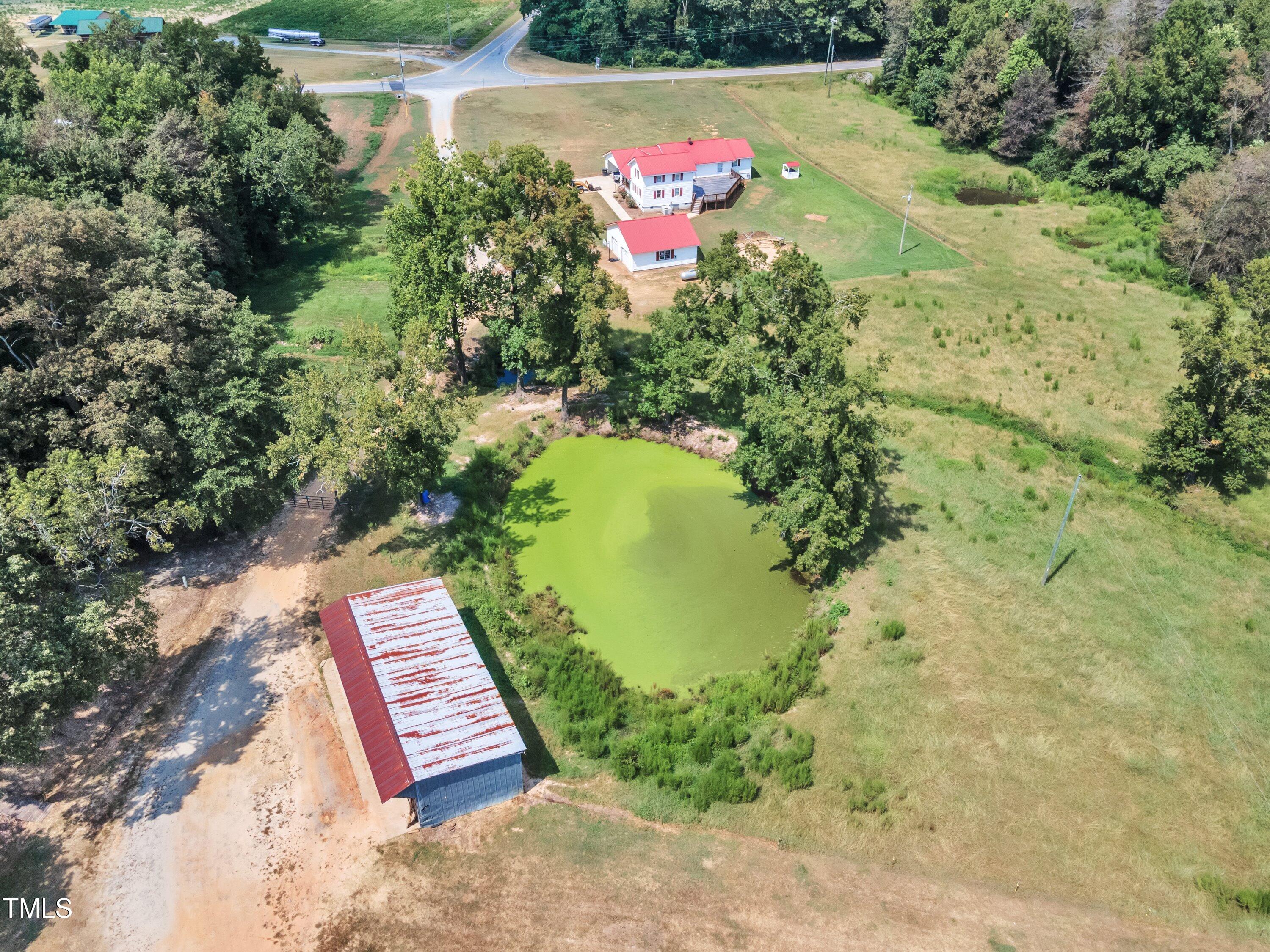 8585 Stricklands Crossroads Road Four Oaks, NC 27524 - Photo 22 of 30 a view of a yard