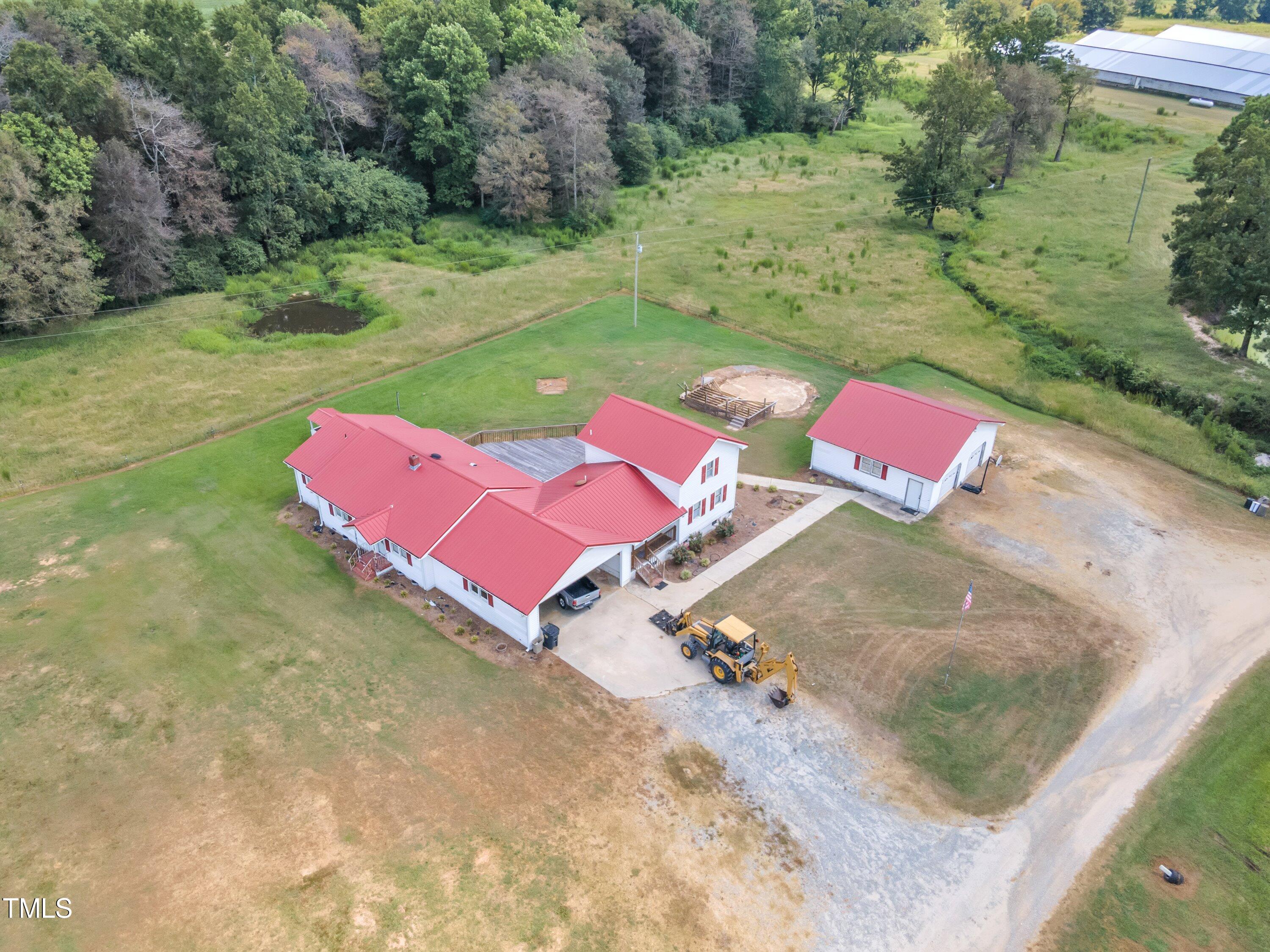 8585 Stricklands Crossroads Road Four Oaks, NC 27524 - Photo 26 of 30 an aerial view of a house with outdoor space