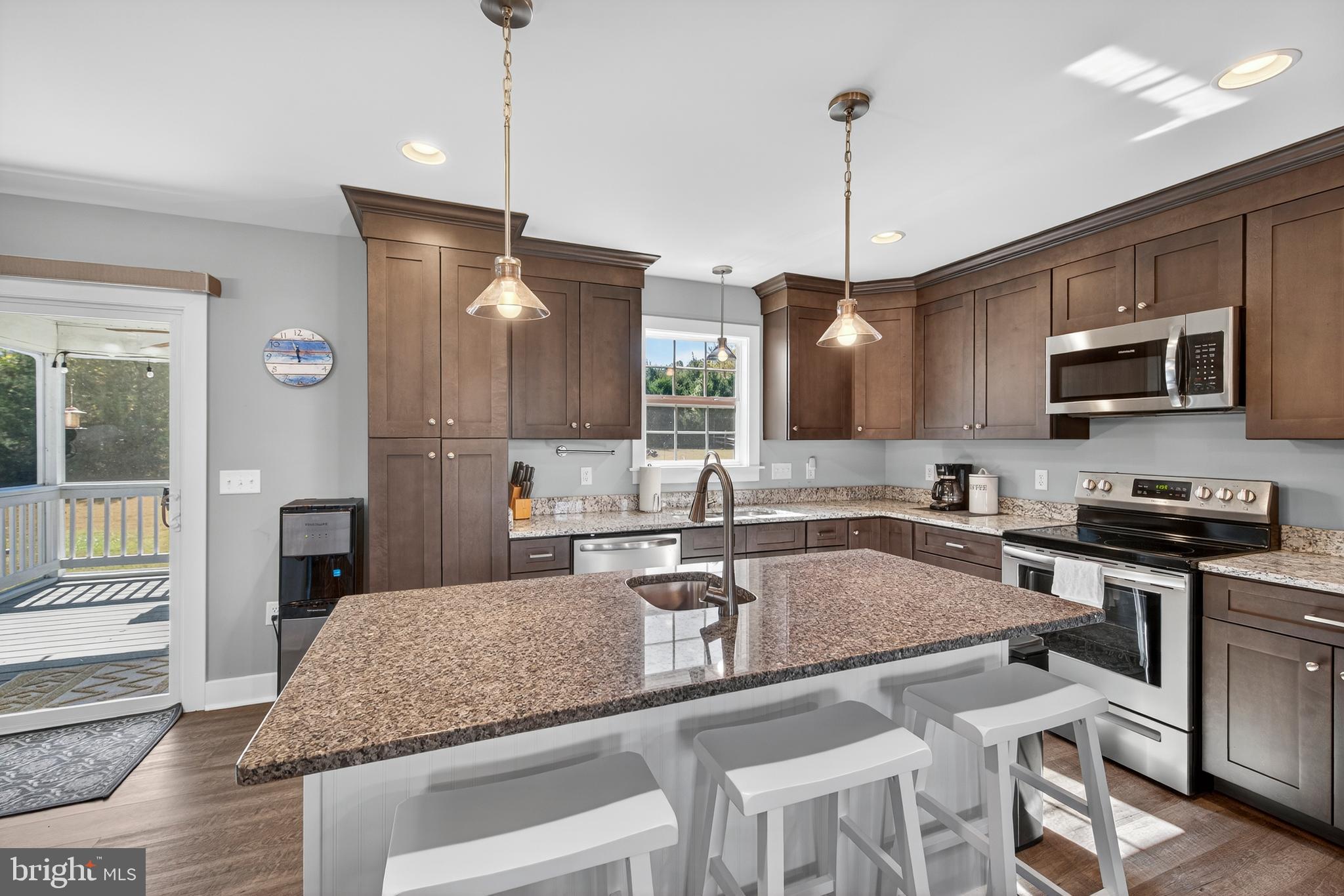 26356 Pennfields Drive Orange, VA 22960 - Photo 16 of 58 a kitchen with center island and stainless steel appliances