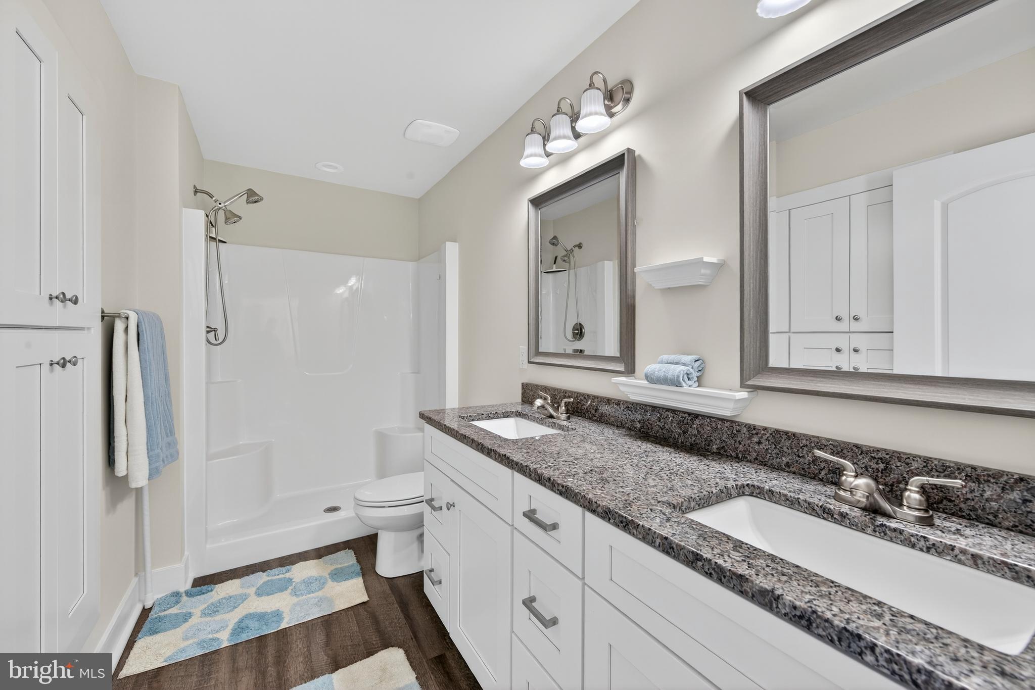 26356 Pennfields Drive Orange, VA 22960 - Photo 29 of 58 a bathroom with a granite countertop double vanity sink mirror and toilet