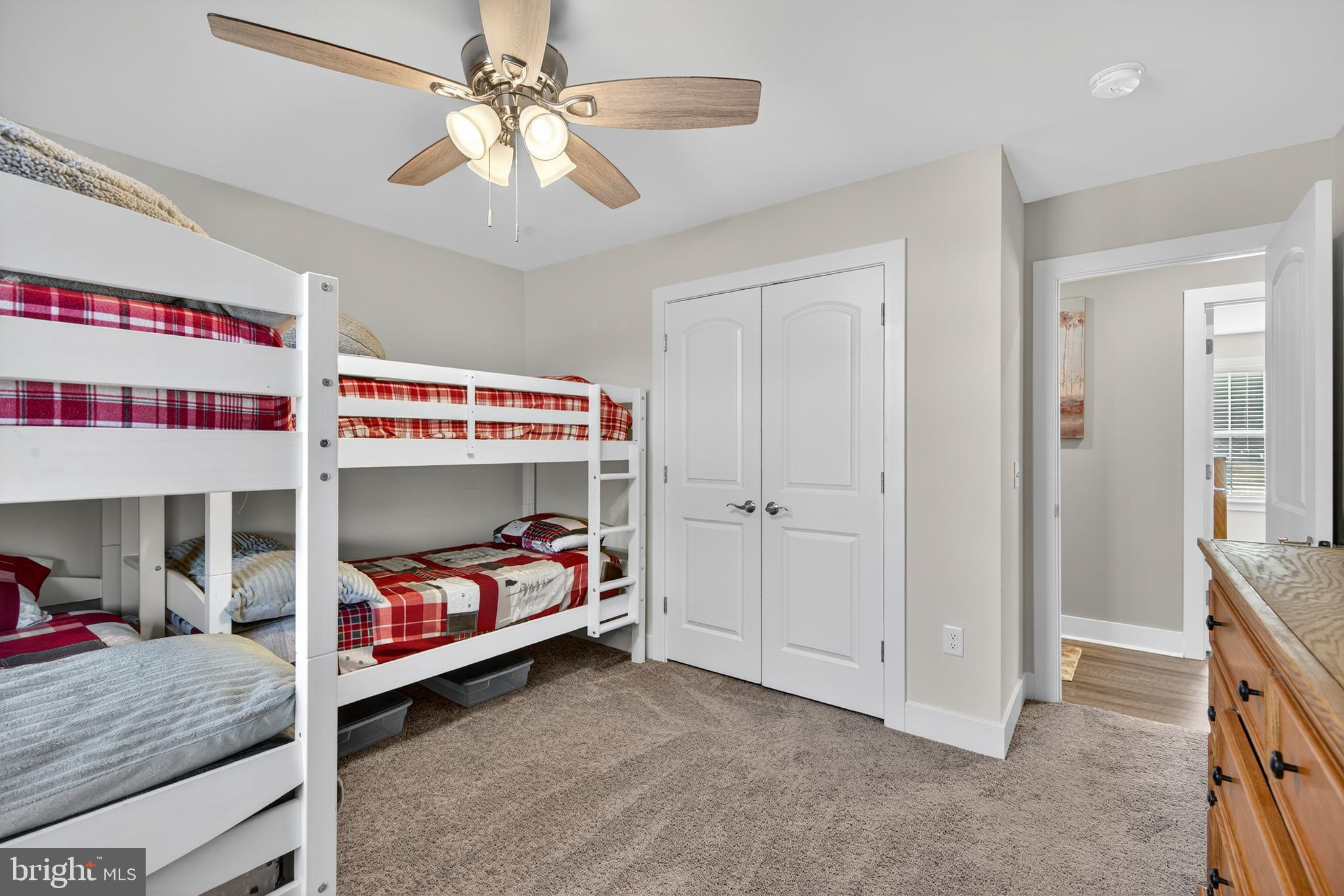 26356 Pennfields Drive Orange, VA 22960 - Photo 32 of 58 a bedroom with a bed and a chandelier