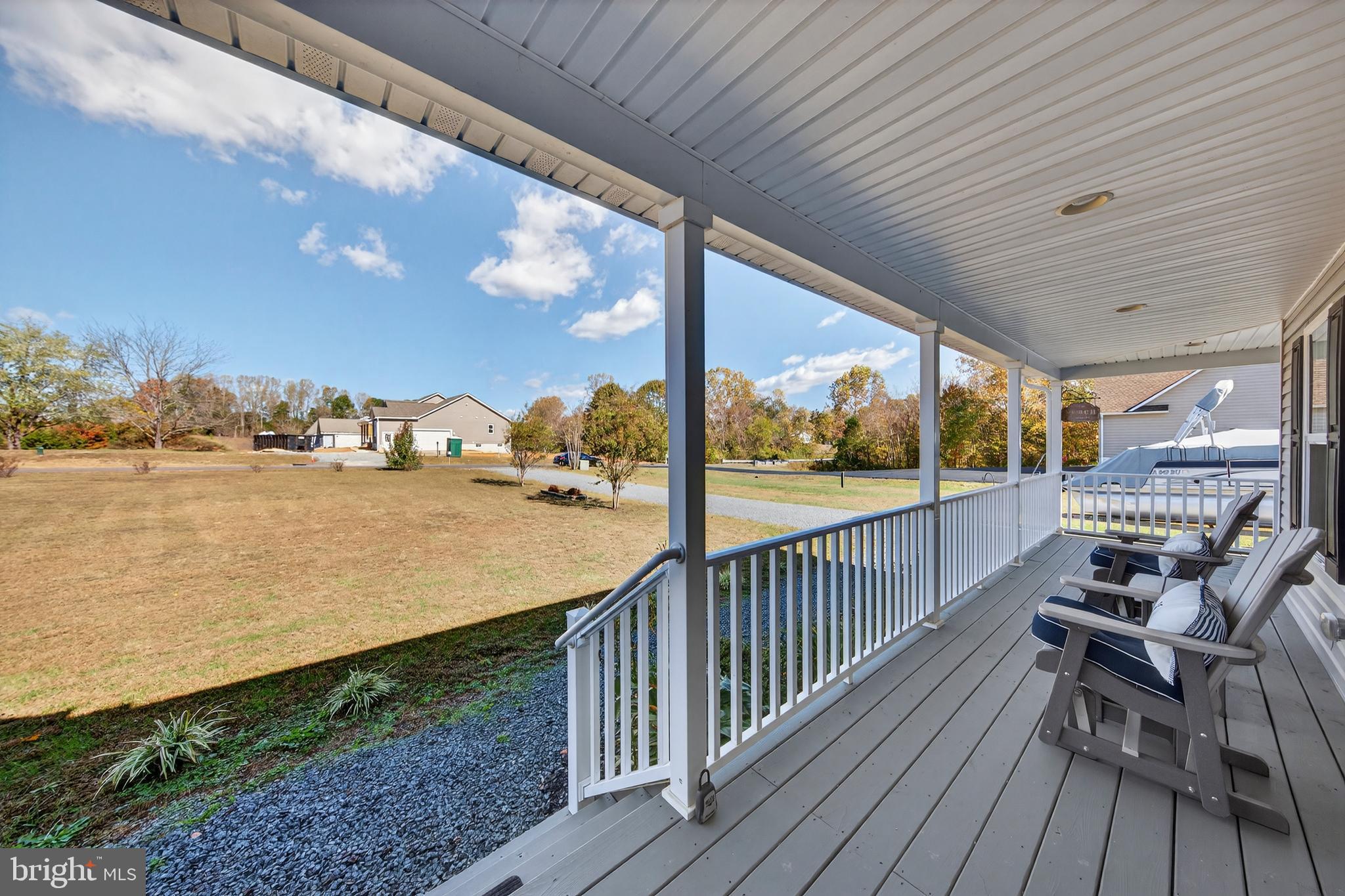 26356 Pennfields Drive Orange, VA 22960 - Photo 40 of 58 a view of a balcony with wooden chairs