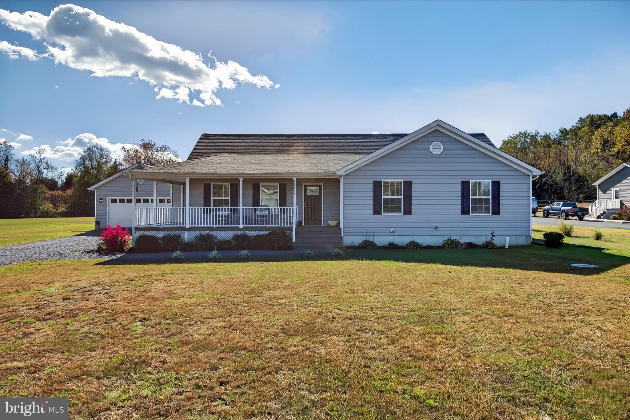 26356 Pennfields Drive Orange, VA 22960 - Photo 58 of 58 a front view of a house with garden