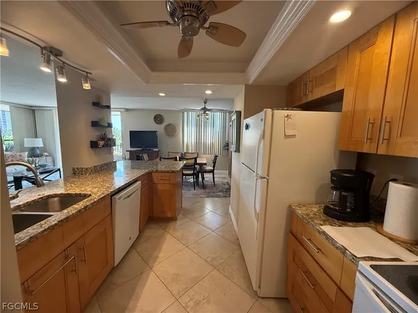 a view of a balcony with chairs