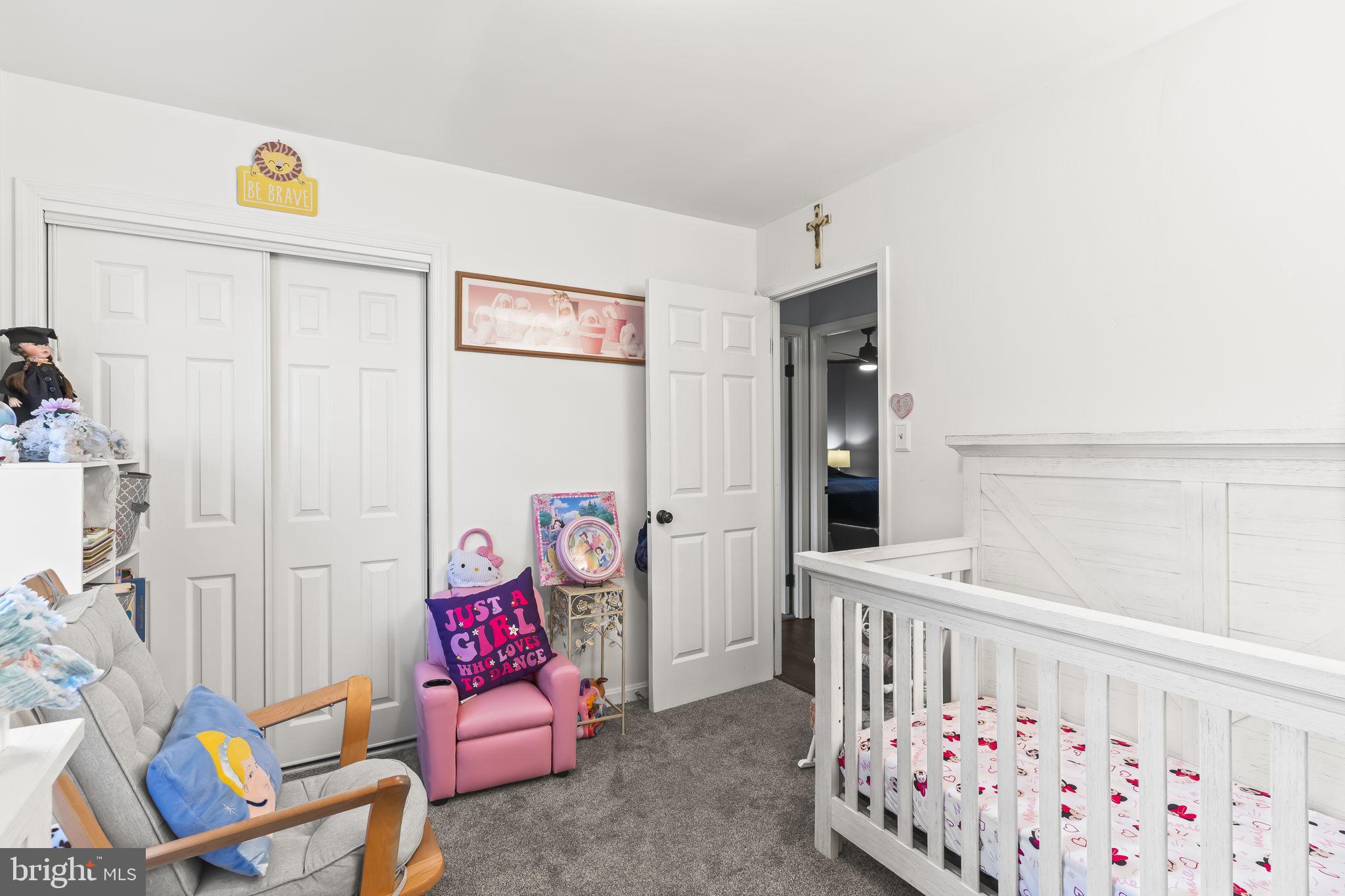 7407 Bellefield Avenue Fort Washington, MD 20744 - Photo 14 of 34 a bedroom with furniture and a window