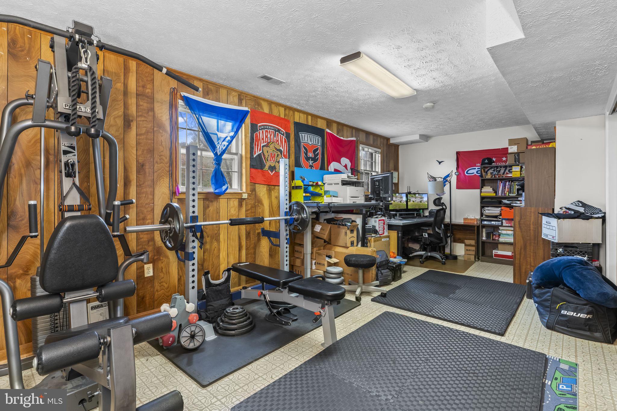 7407 Bellefield Avenue Fort Washington, MD 20744 - Photo 24 of 34 a room with gym equipment and lots of equipment