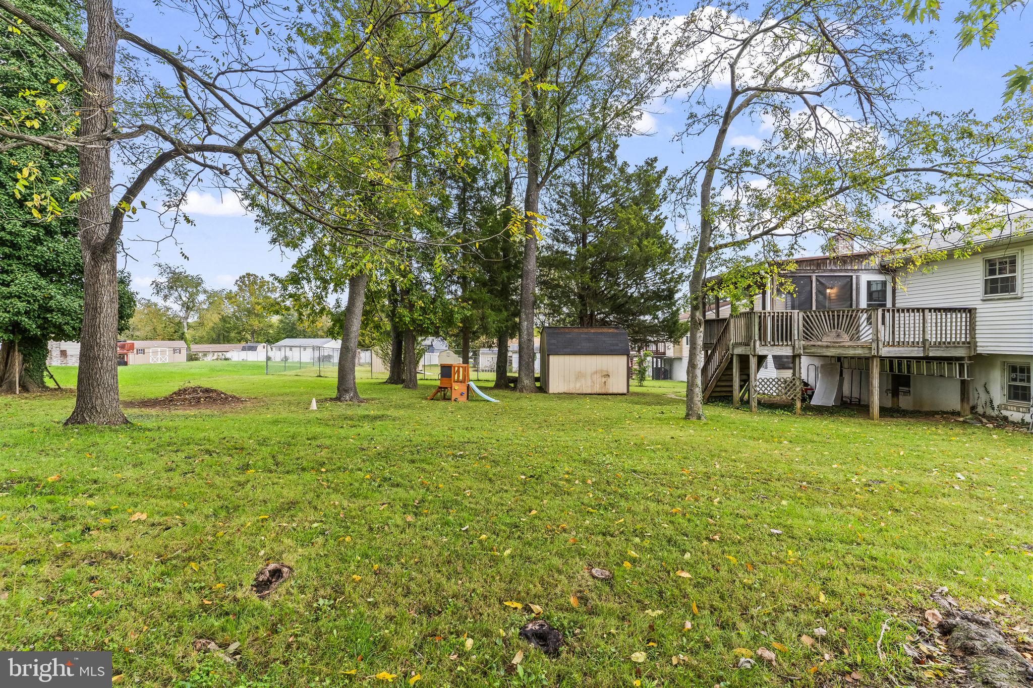 7407 Bellefield Avenue Fort Washington, MD 20744 - Photo 31 of 34 a view of a house with backyard and garden