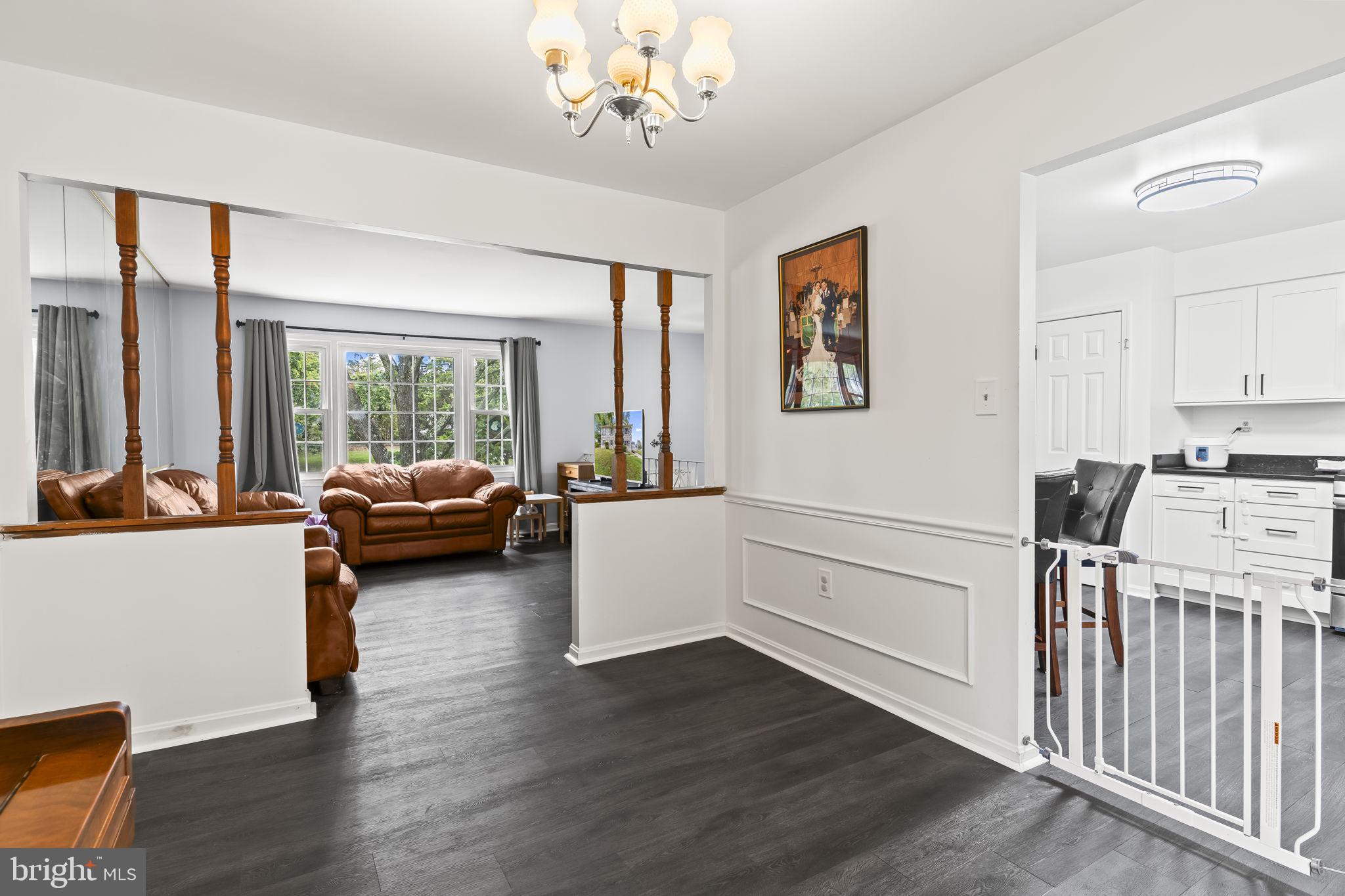 7407 Bellefield Avenue Fort Washington, MD 20744 - Photo 9 of 34 a living room with furniture and a large window