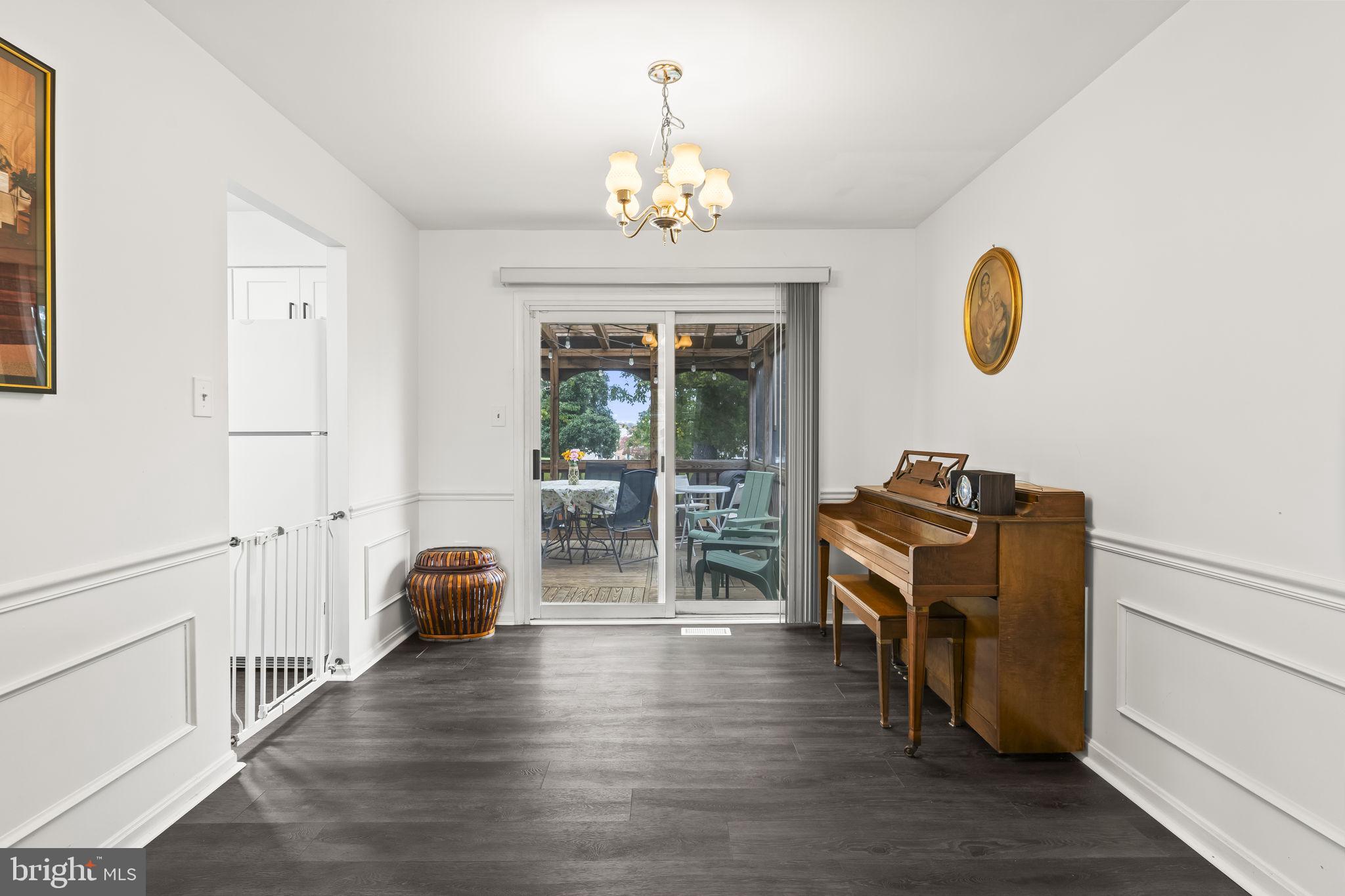 7407 Bellefield Avenue Fort Washington, MD 20744 - Photo 10 of 34 a view of a workspace with furniture and a window