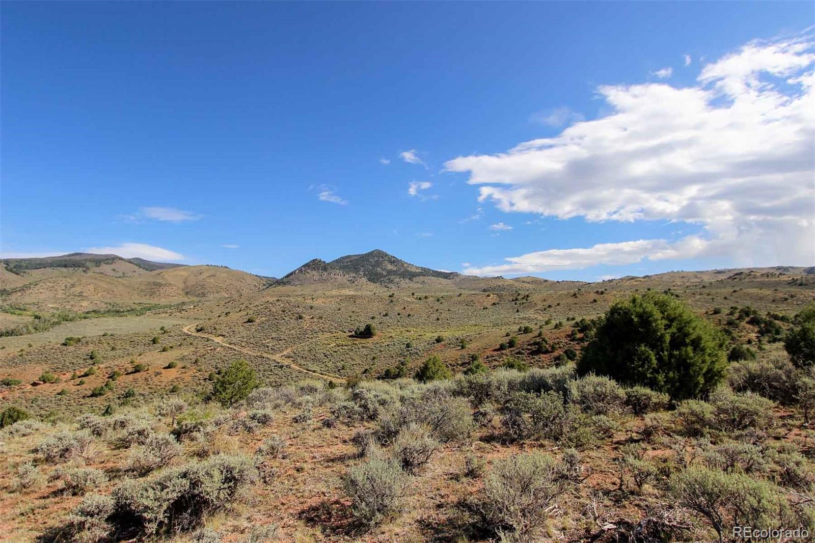 Copper Spur Road Bond, CO 80423 - Photo 25 of 40 a view of a large mountain with mountains in the background