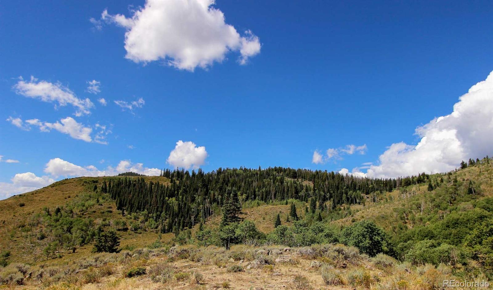Copper Spur Road Bond, CO 80423 - Photo 33 of 40 a sunset view with a building in background