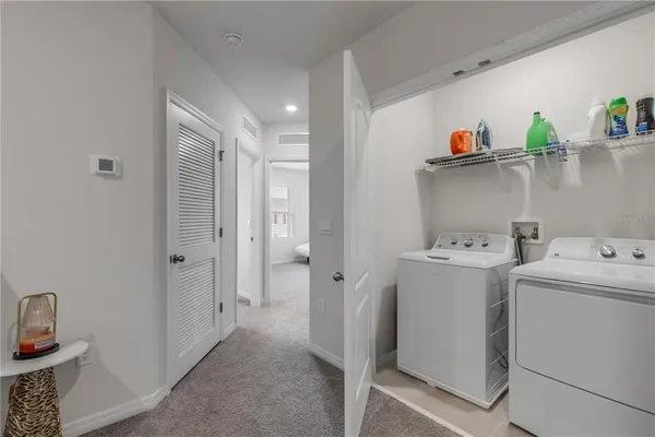 a view of storage room with washer and dryer