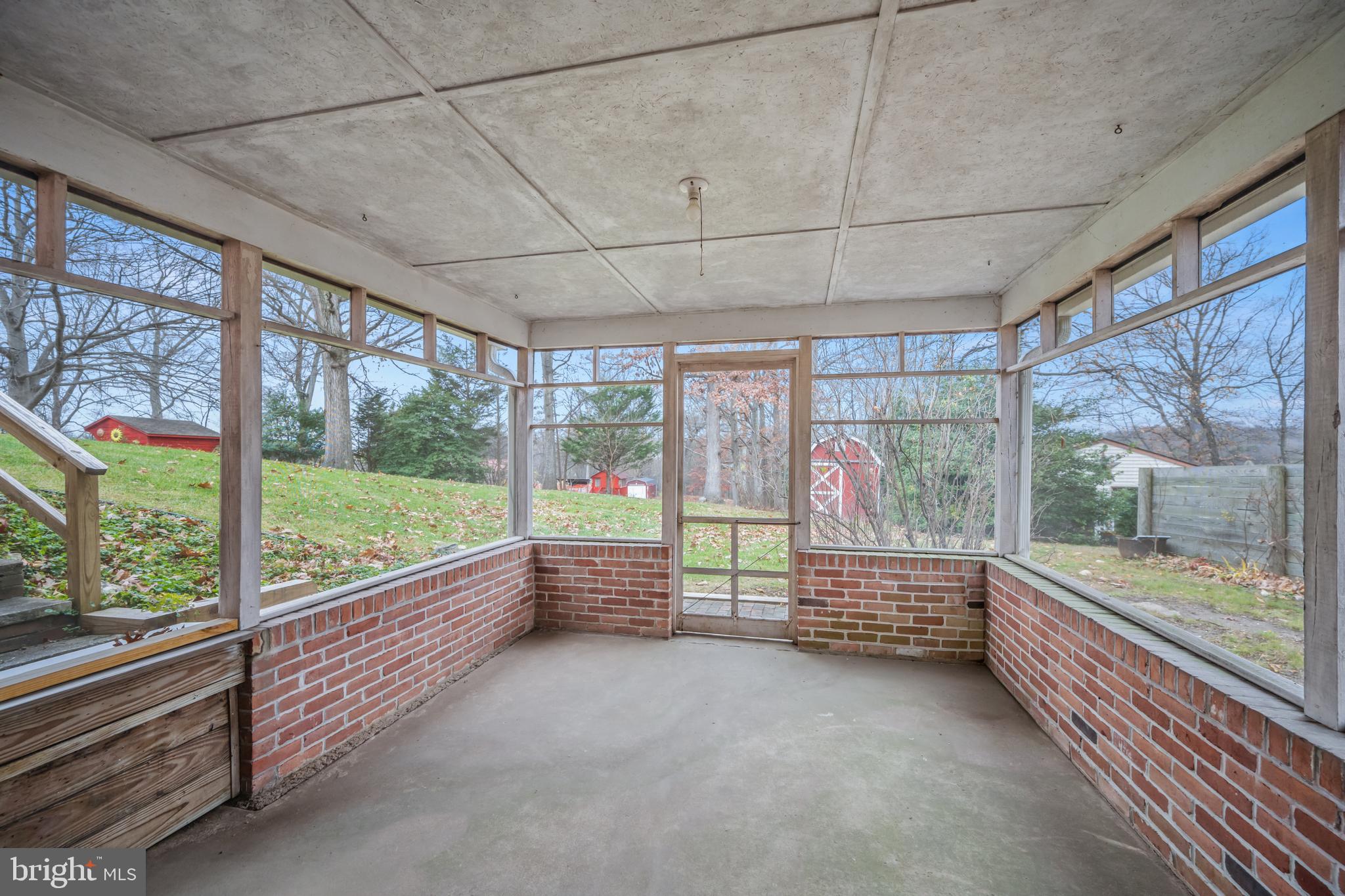 5402 Hines Road Frederick, MD 21704 - Photo 32 of 51 a view of a room with air conditioner and outdoor seating