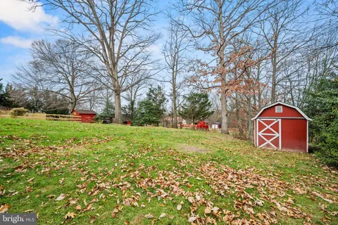 a view of a back yard with an trees