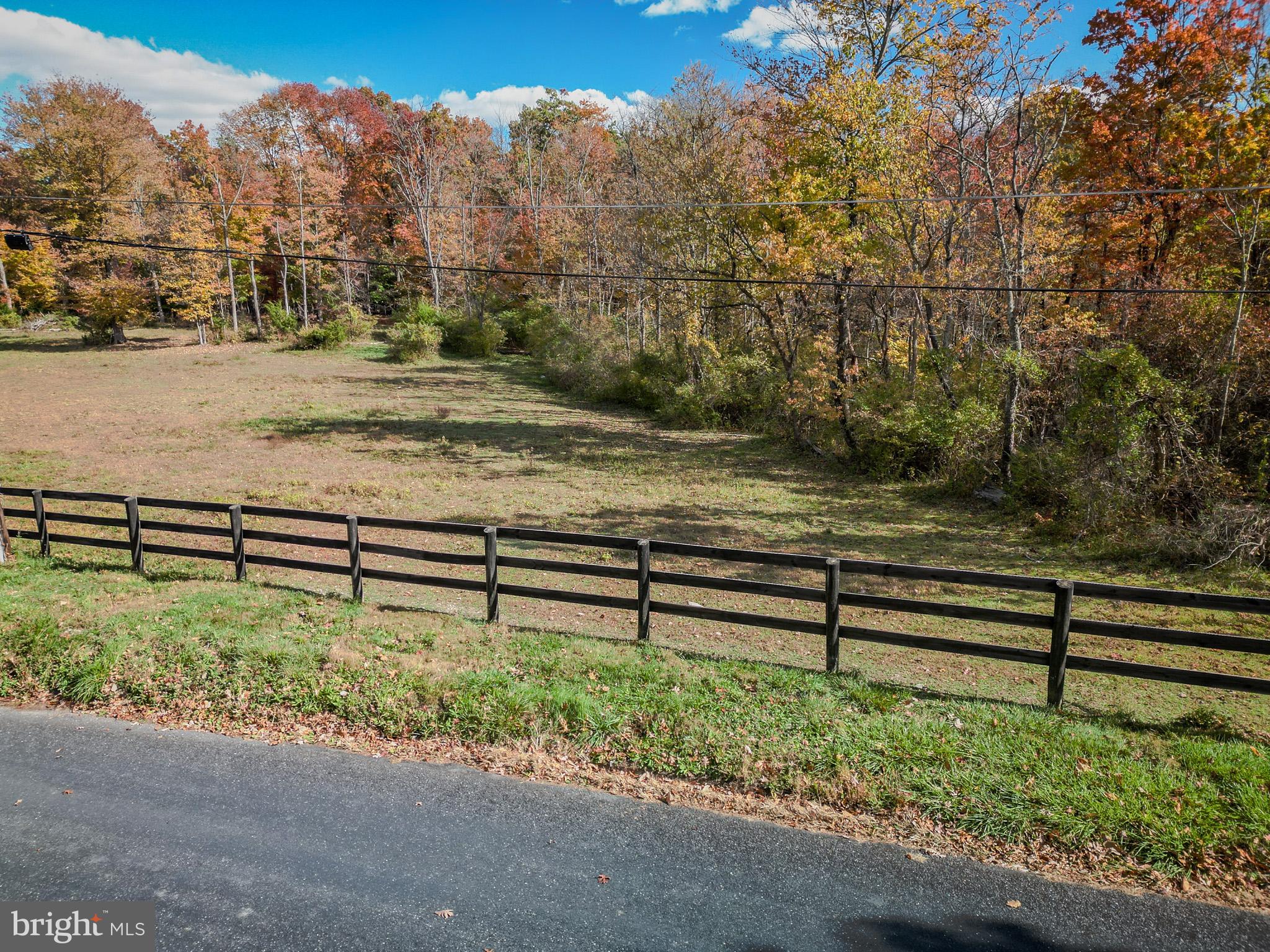 5402 Hines Road Frederick, MD 21704 - Photo 46 of 51 a view of a yard with wooden fence