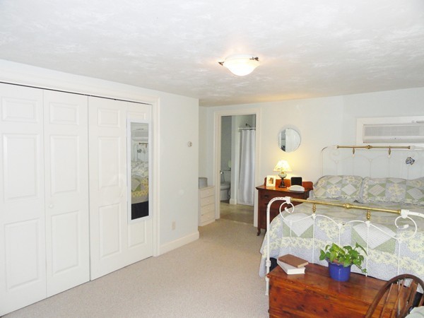 61 Coldbrook Road Oakham, MA 01068 - Photo 12 of 30 a living room with furniture and a table