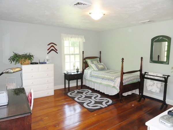 61 Coldbrook Road Oakham, MA 01068 - Photo 13 of 30 a bedroom with furniture and a window