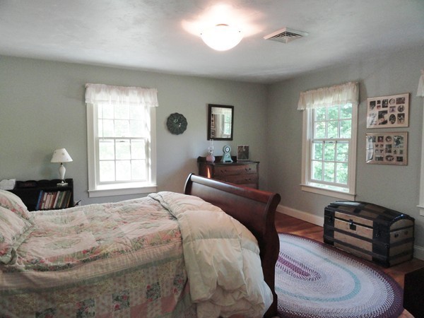 61 Coldbrook Road Oakham, MA 01068 - Photo 15 of 30 a bedroom with a bed couch and window