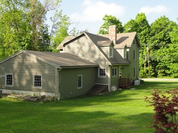61 Coldbrook Road Oakham, MA 01068 - Photo 29 of 30 a view of a house with a yard
