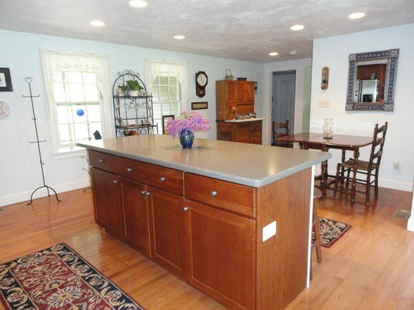 61 Coldbrook Road Oakham, MA 01068 - Photo 10 of 30 a kitchen with stainless steel appliances granite countertop a sink and a refrigerator